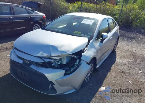 2021 Toyota Corolla Hybrid Le from USA, damaged, VIN JTDEAMDE6MJ034279